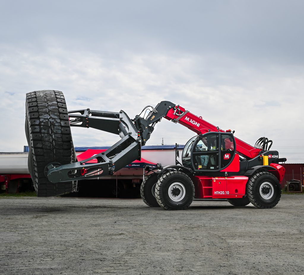 rotating telehandler holding tyre