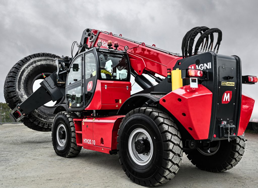 rotating telehandler holding tyre